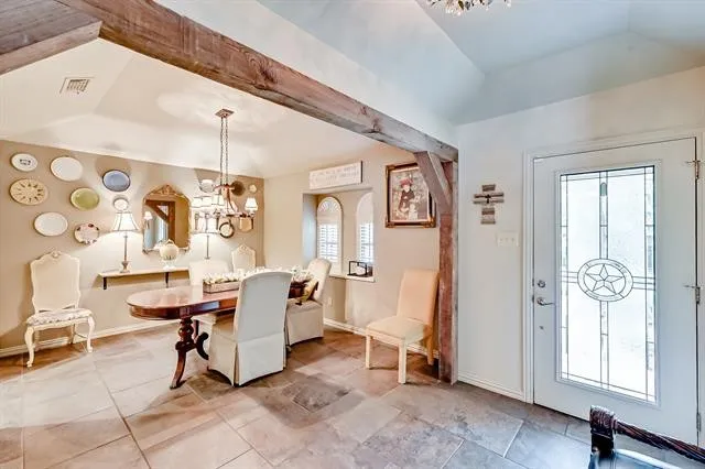 Dining Room with Reclaimed Beam & Tile Floors