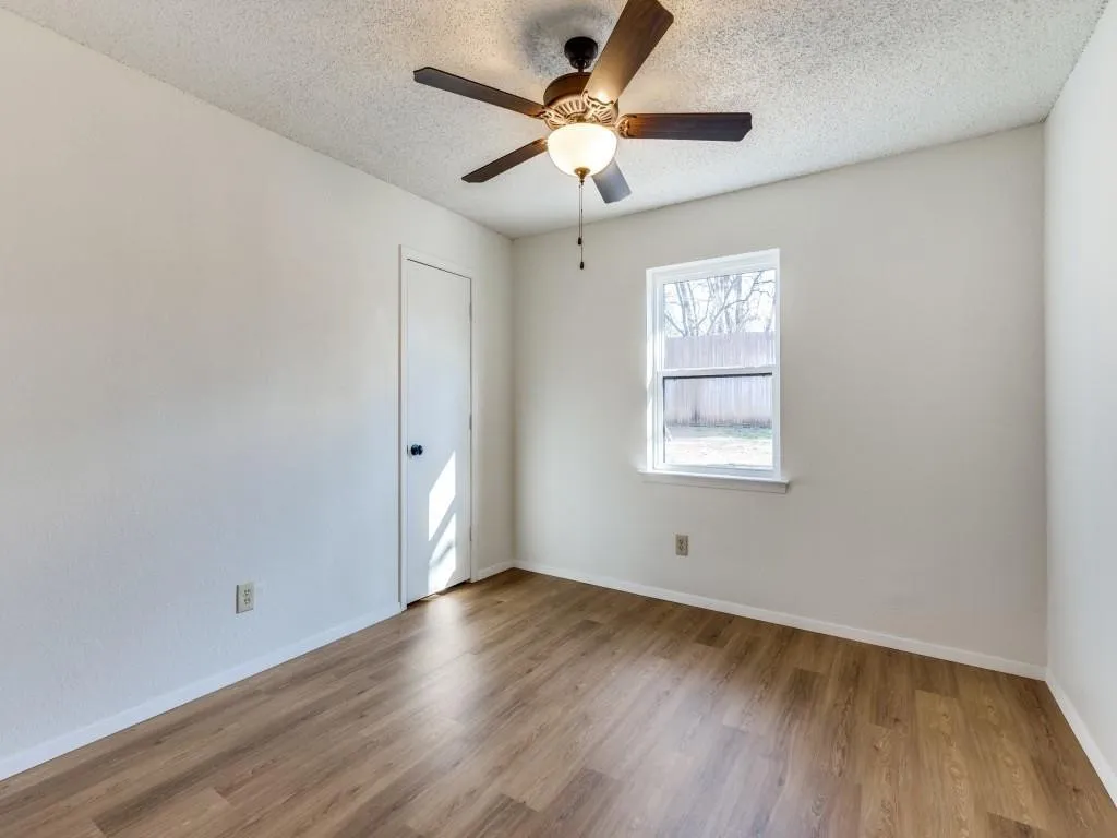 Bedroom with New LVP Flooring & Fresh Paint