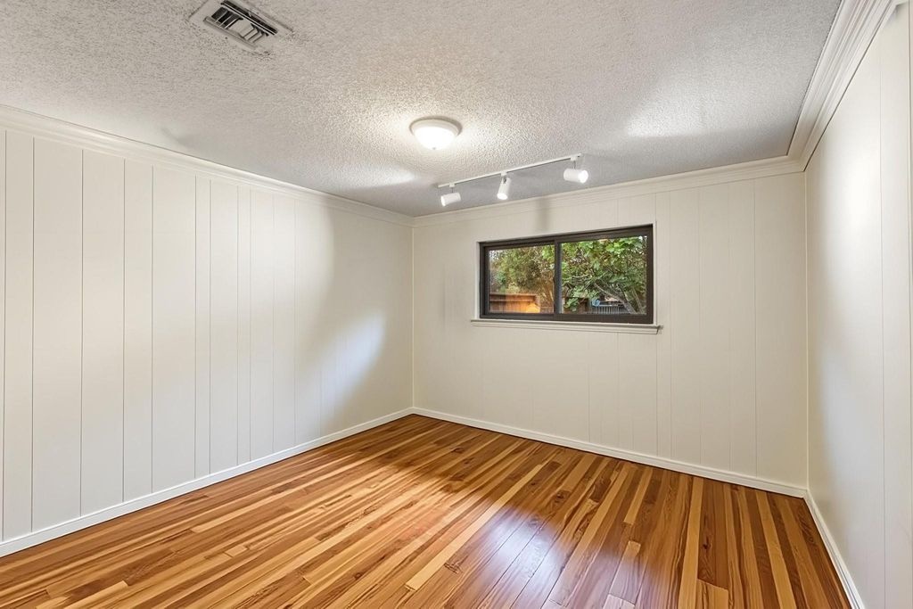 Refinished Bedroom with Hardwood Floors
