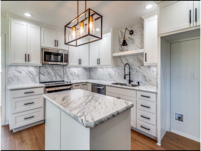 Kitchen with Marble Backsplash & Island